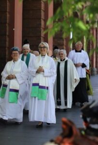About to process into CCSL: some of the ‘monstrous regiment’ of ordained women from outside of the Sydney Diocese: The Rev’d Danni Clark (Brisbane), The Rev’d Daphne May (Canberra-Goulburn), the Rev’d Ann Edwards (Brisbane) and the Venerable Dr Colleen O’Reilly AM (Melbourne), 17 September 2023.